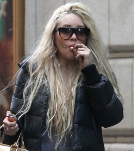 Amanda Bynes seen smoking a hand rolled cigarette in New York